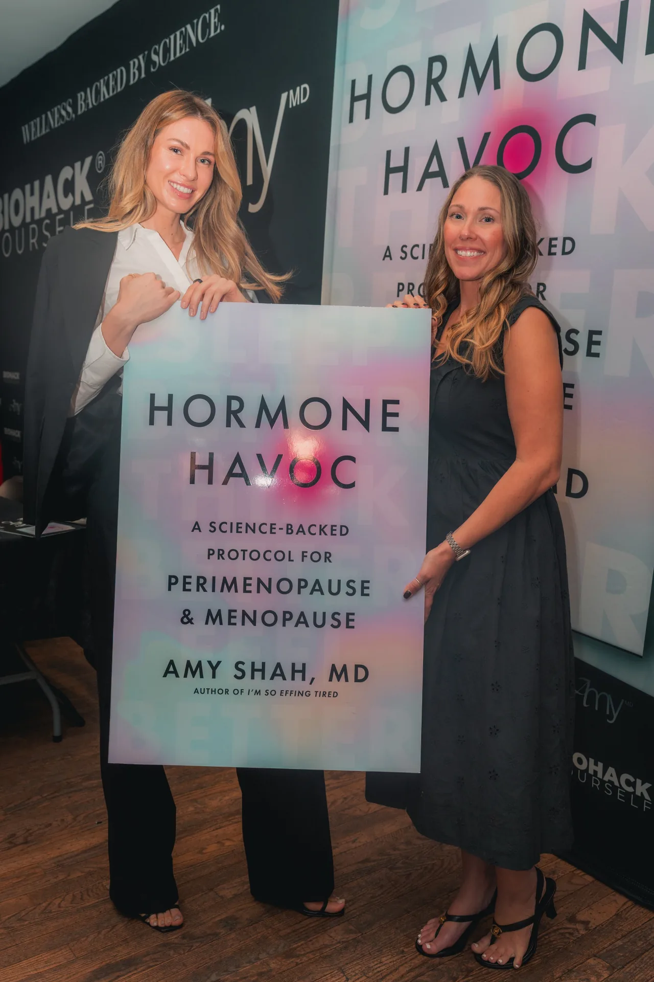 Dr. Amy Shah with the Hormone Havoc poster