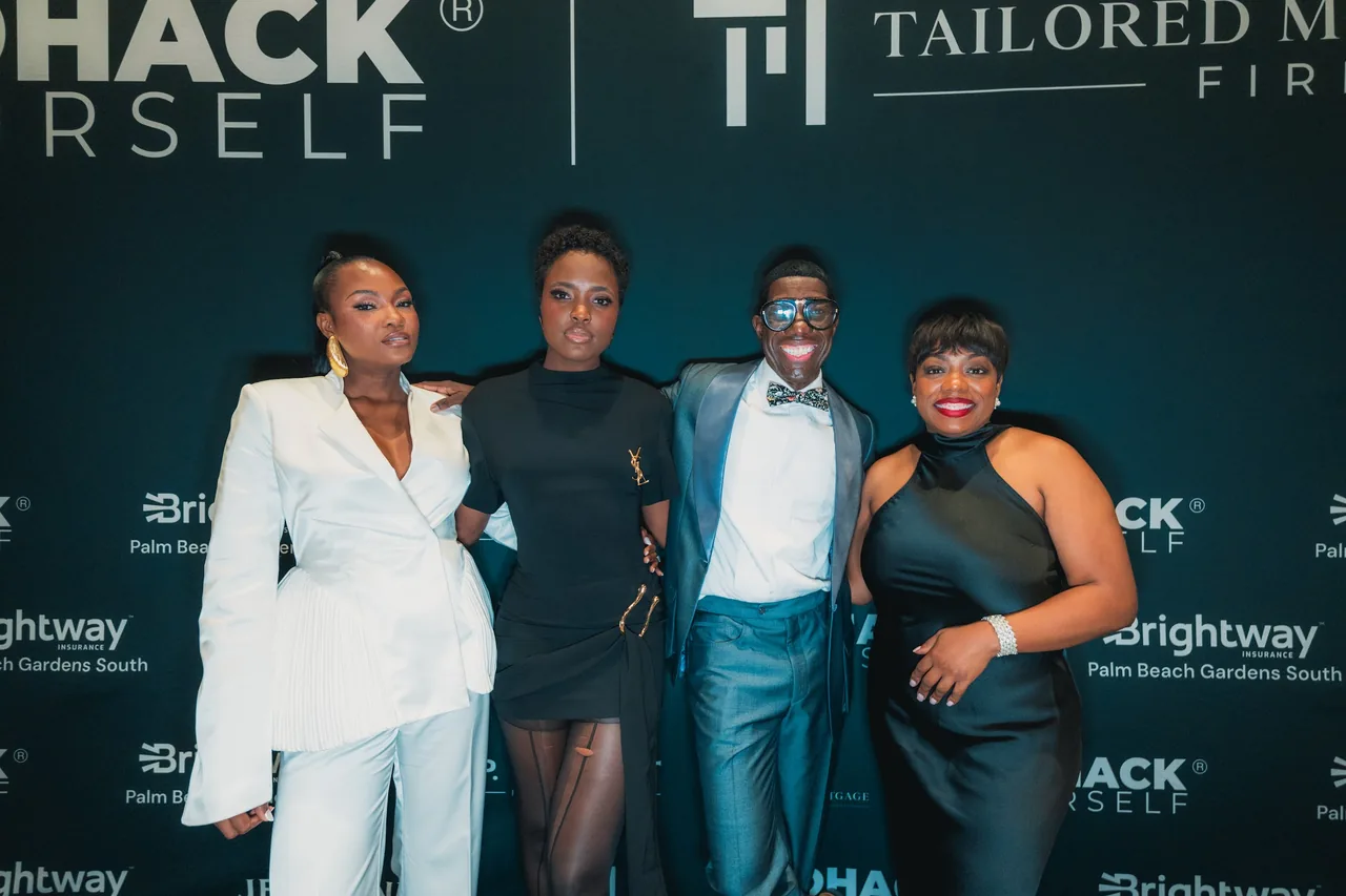 Four women at the Tailored M backdrop