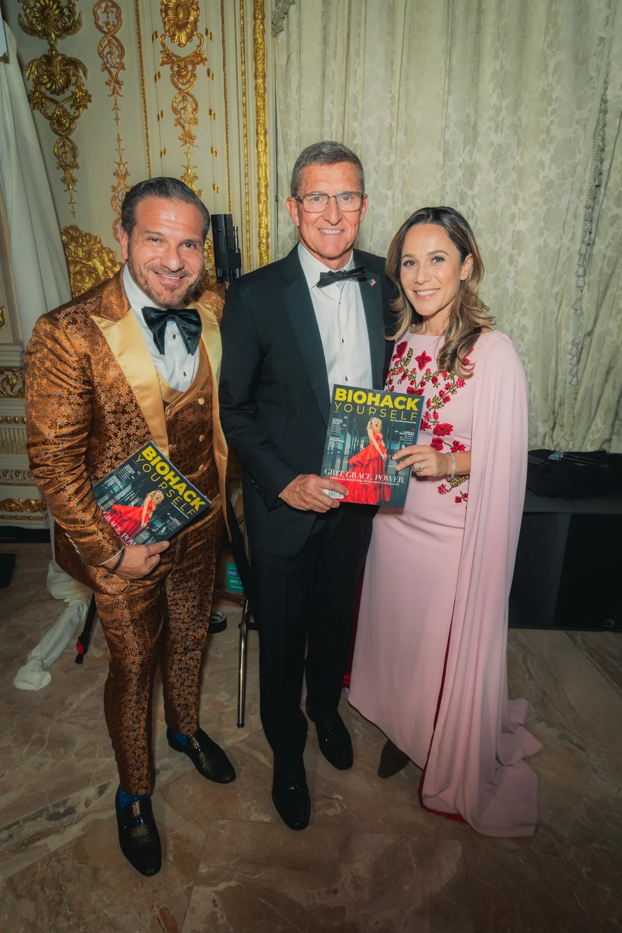 Guests with the magazine in the Mar-a-Lago ballroom