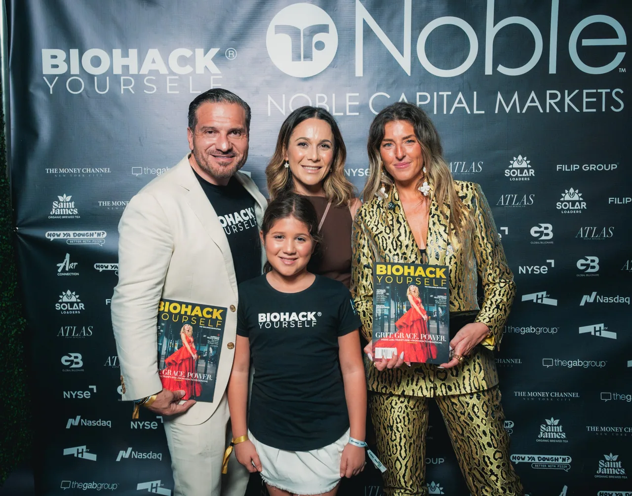 The Lolli family with the magazine at Wall Street South