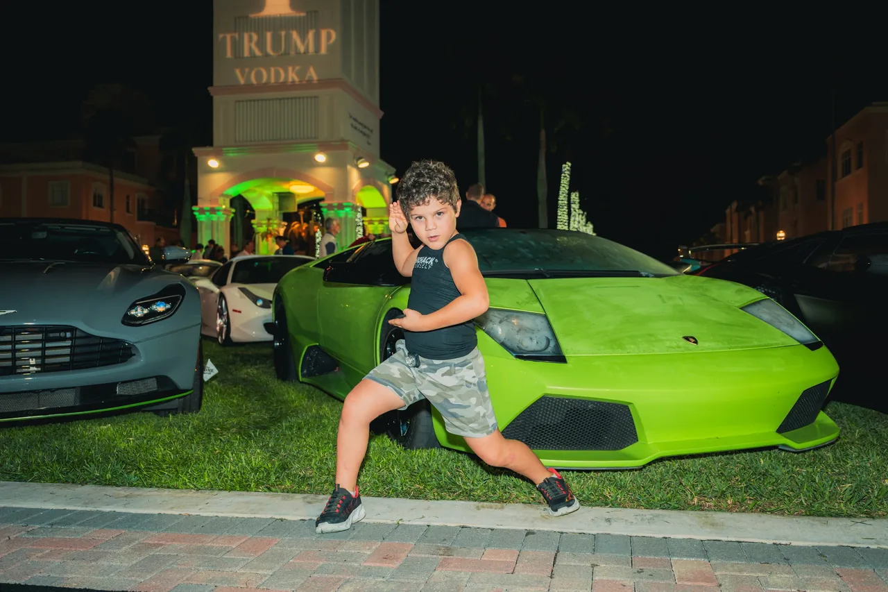 A young guest with a green Lamborghini
