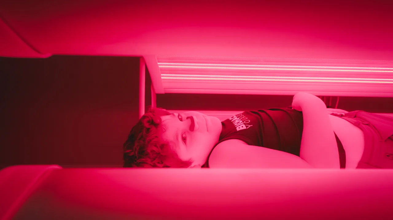 A red-light therapy bed at the summit